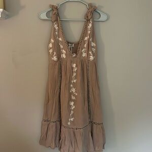 tan embroidered sun dress with tie straps, flowy, falls above the knee